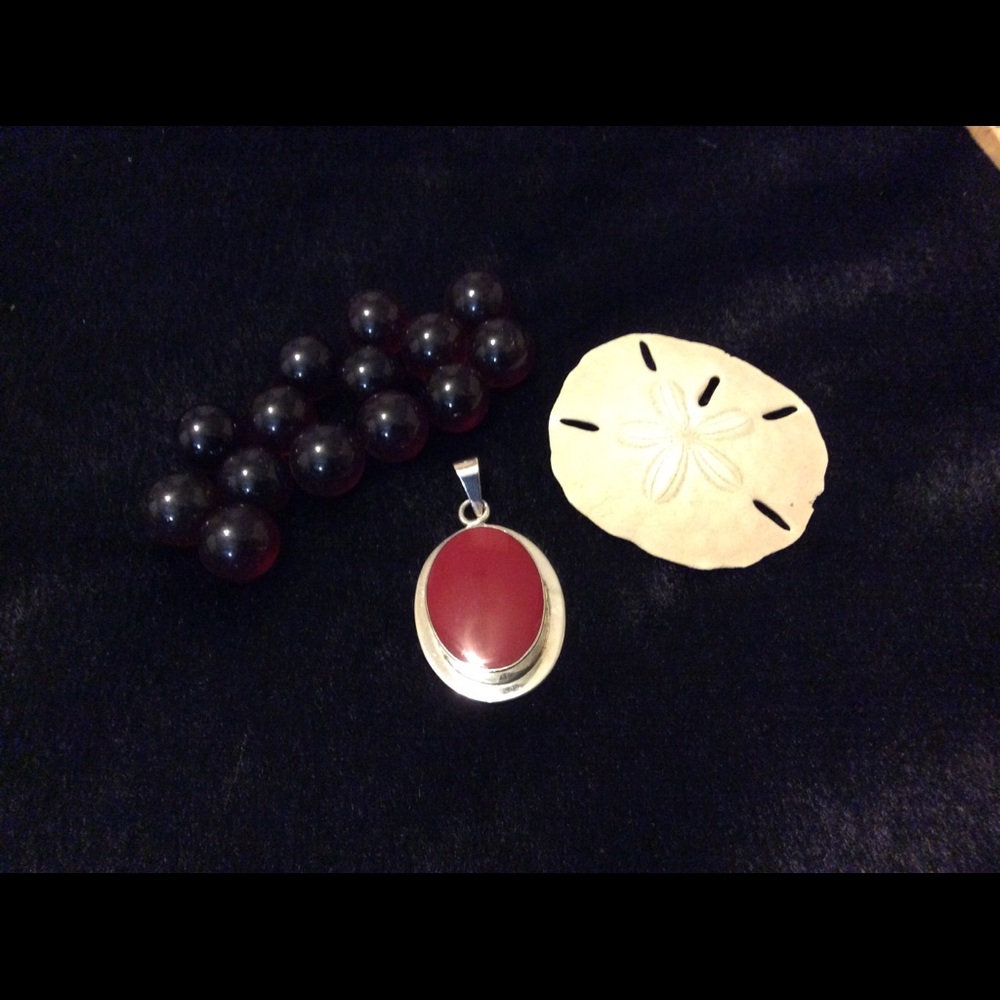 Sterling and red stone pendant